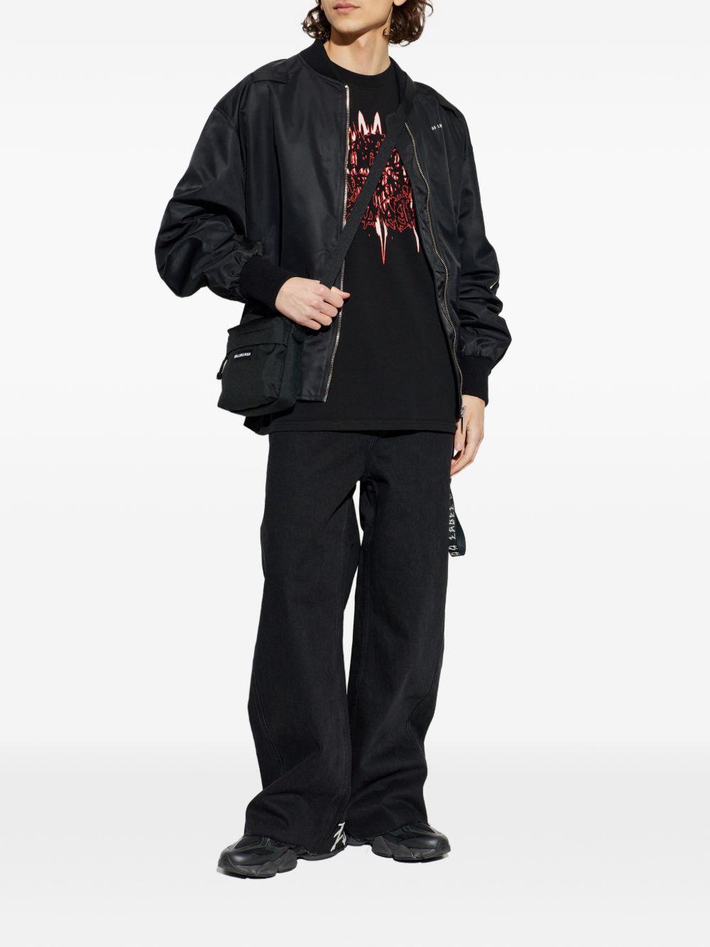 Pantaloni neri con logo 