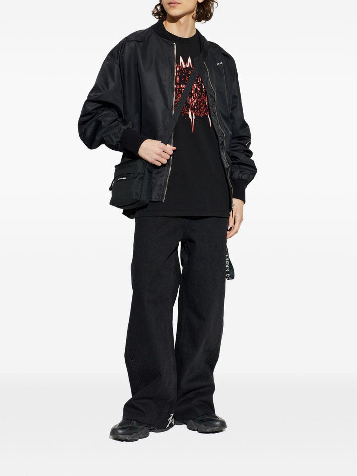 Pantaloni neri con logo 