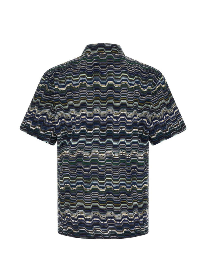 Polo blu con motivo zig zag 