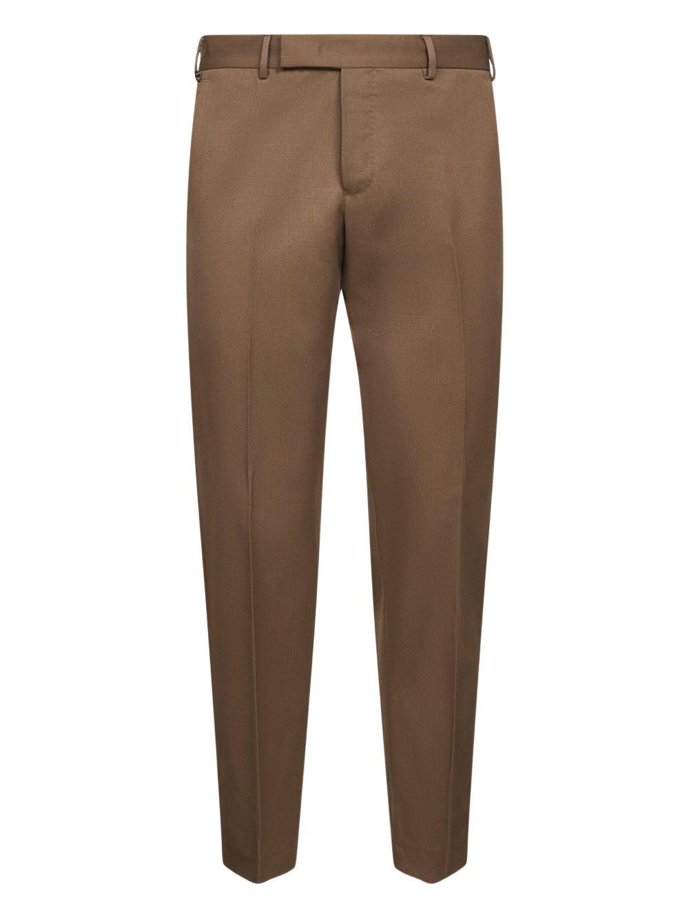 Khaki trousers with crease
