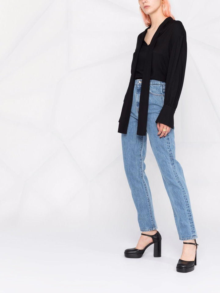 Jeans dritti con applicazione 