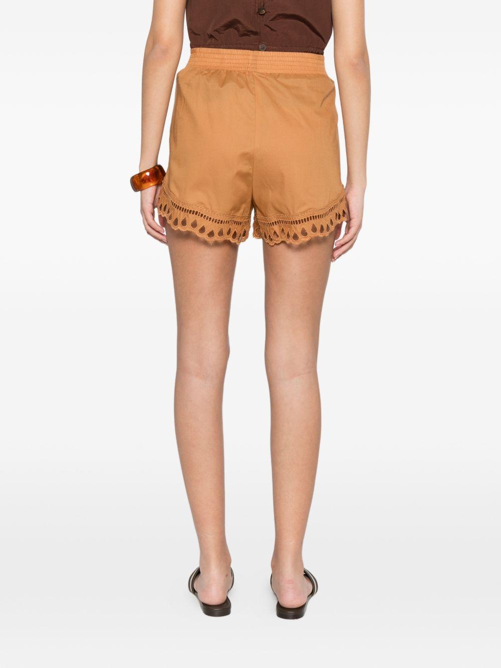 Shorts con ricami in pizzo 