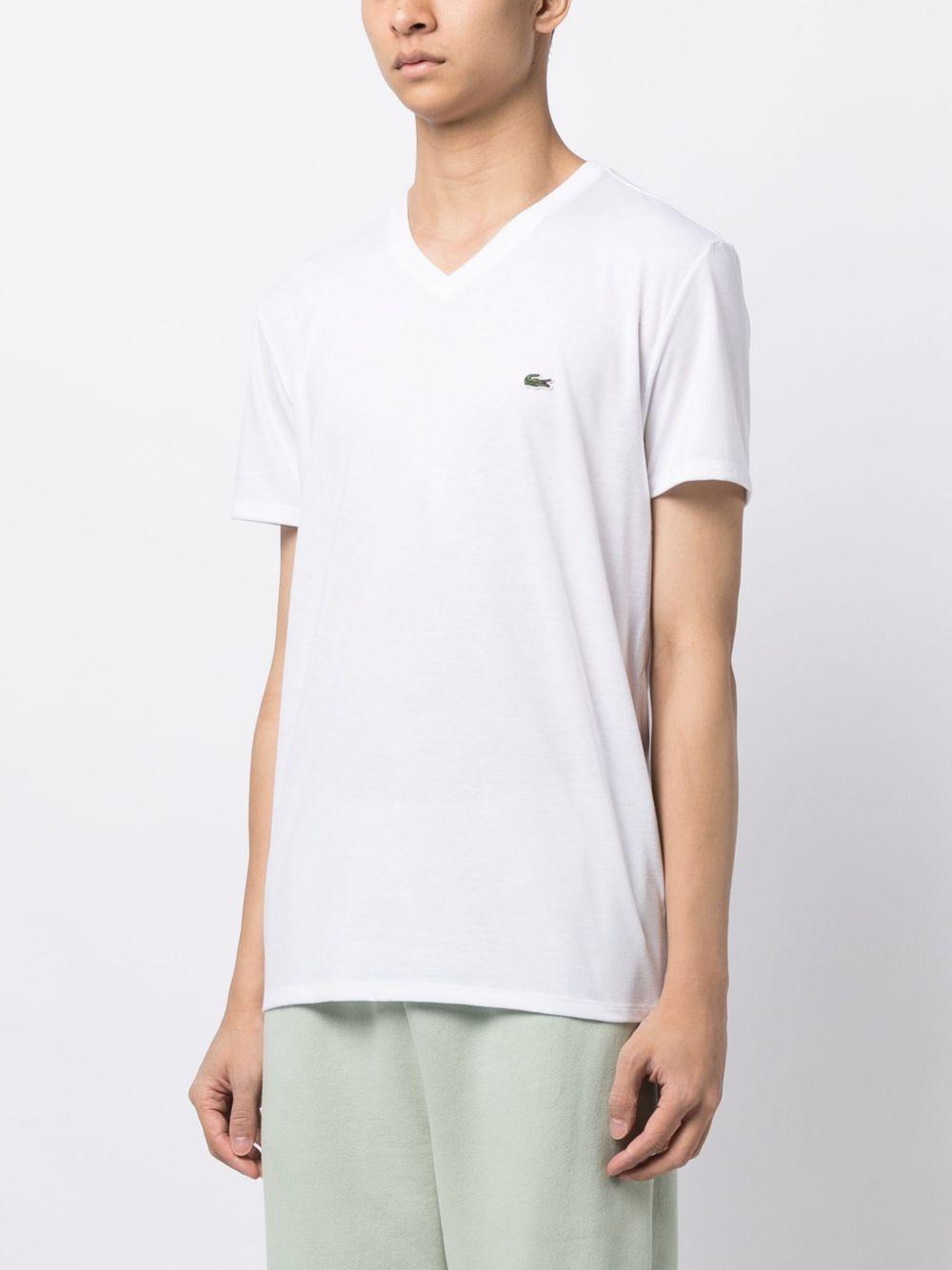 T-shirt bianca con scollo a V 