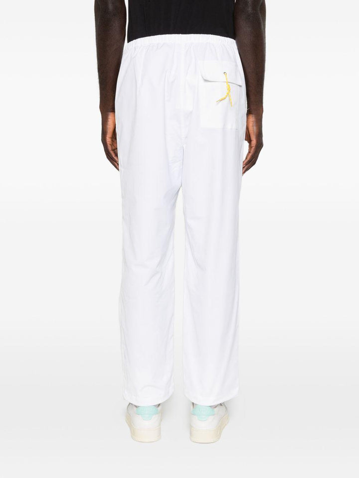 Pantaloni bianchi plissettati con coulisse 