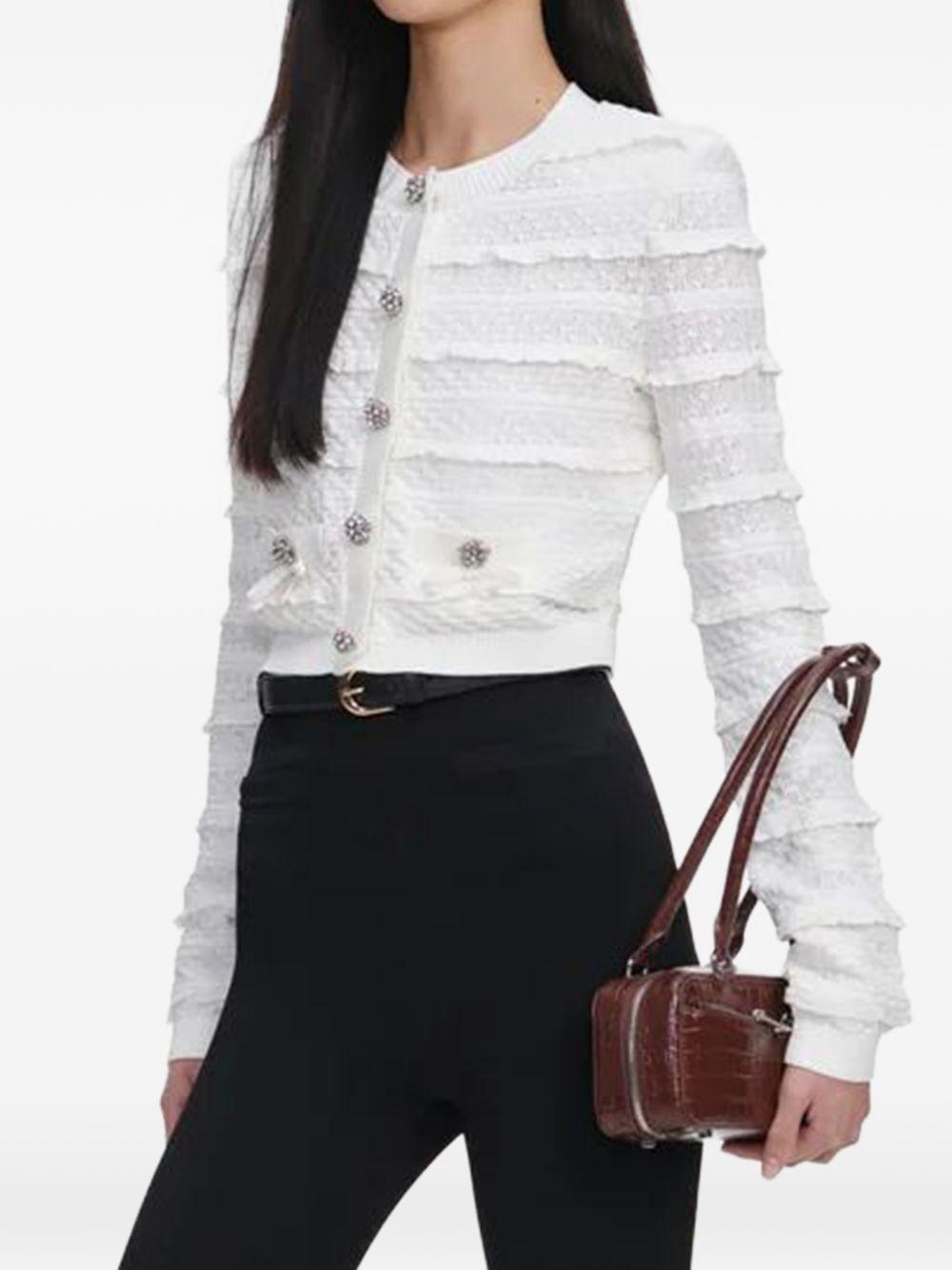 Cardigan con lavorazione 