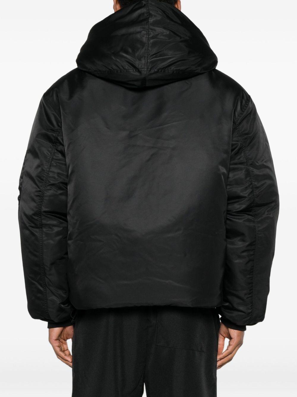 Bomber nero Peacemaker con cappuccio e zip 