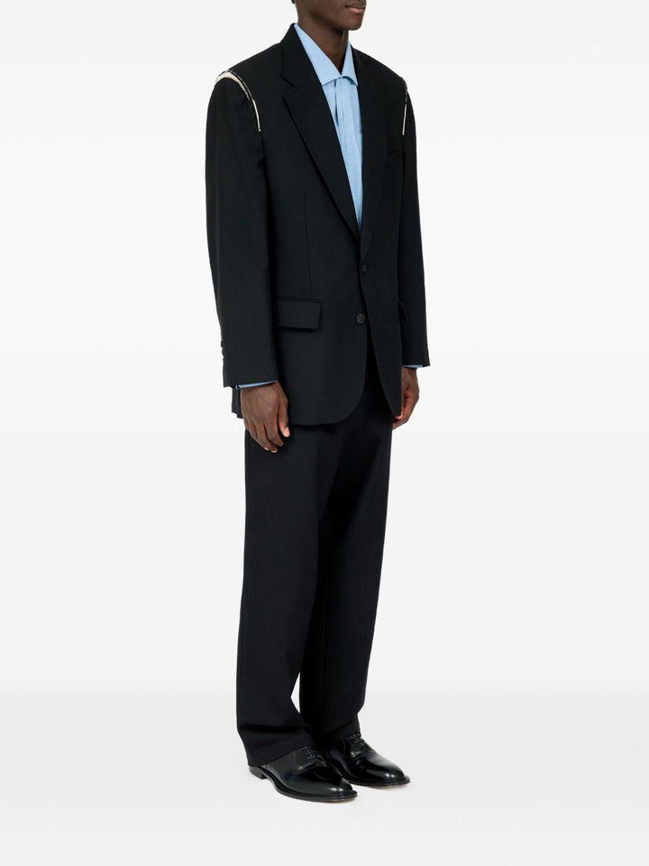 Blazer nero con spalline 