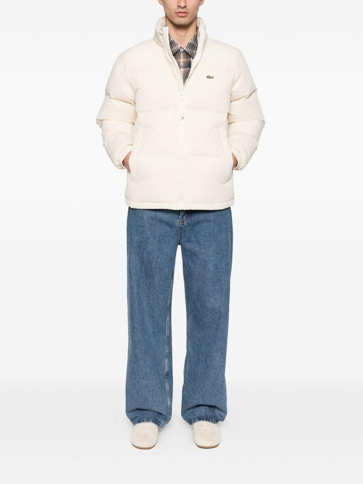 Piumino beige con zip 
