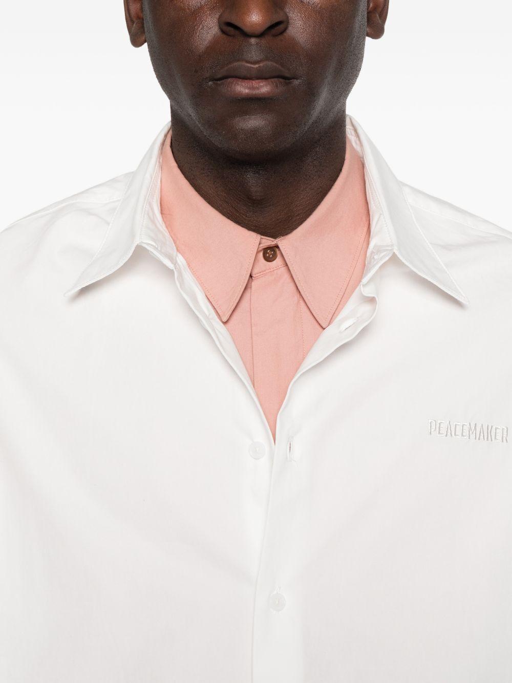 Camicia bianca con bottoni 