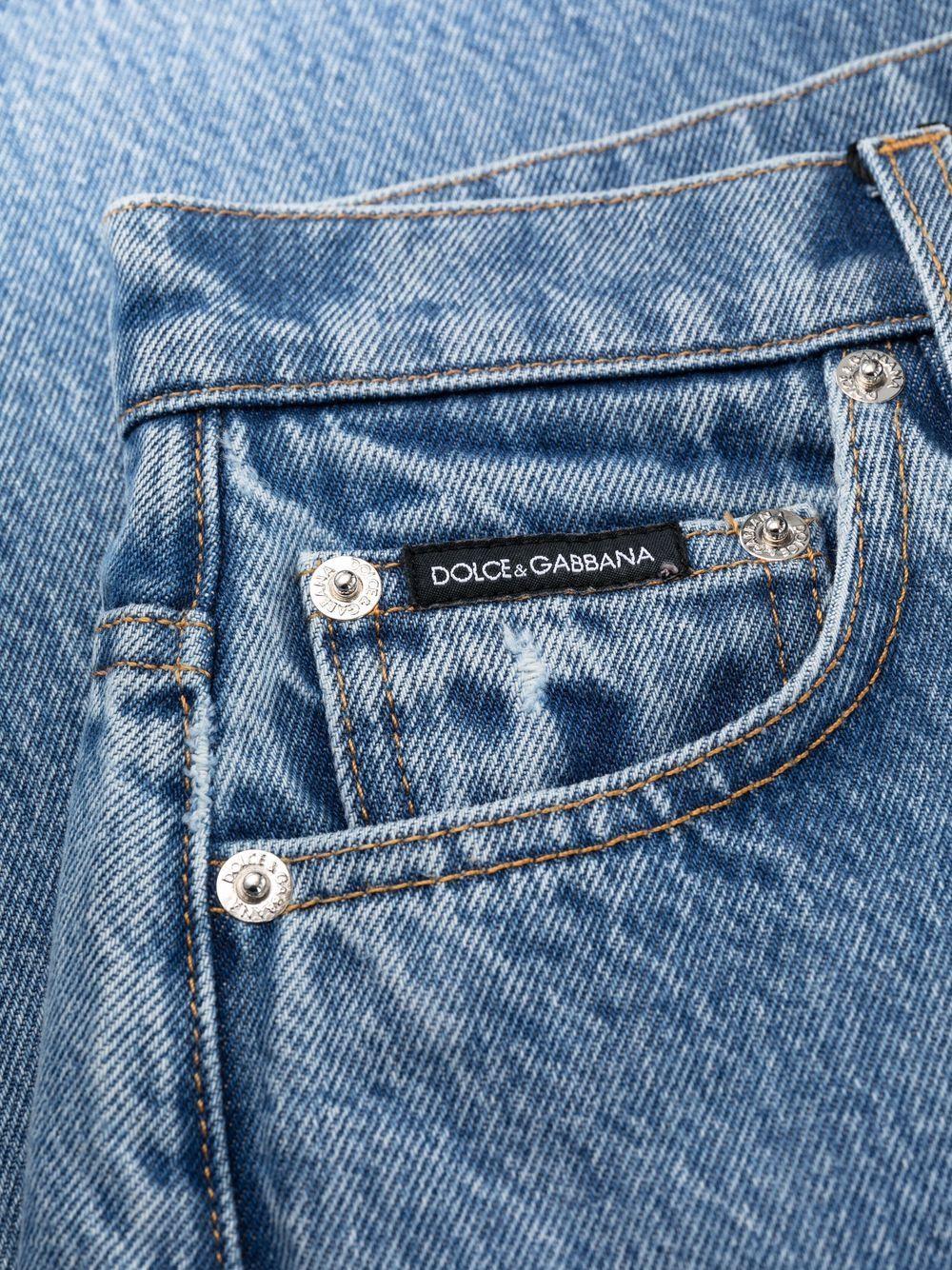 Jeans dritti con applicazione 