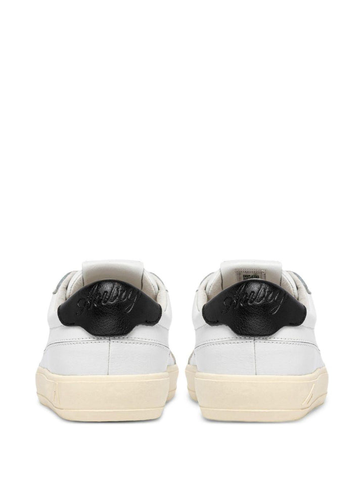 Sneakers bianche con pannelli in pelle 