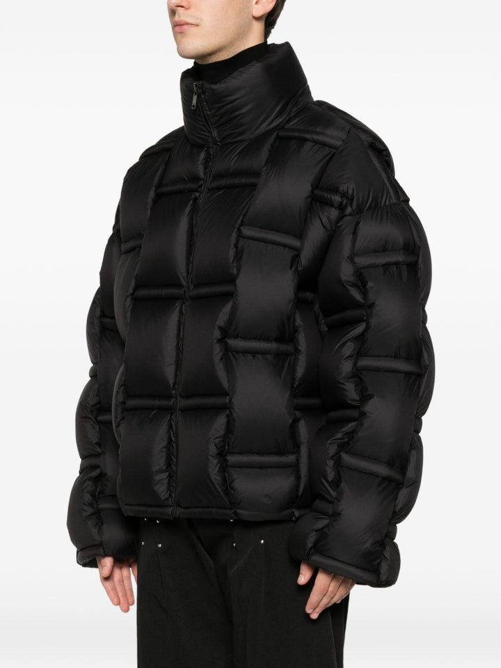 Piumino nero con inserti 
