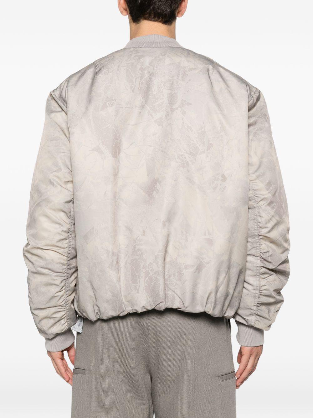 Bomber a colori neutri con zip 