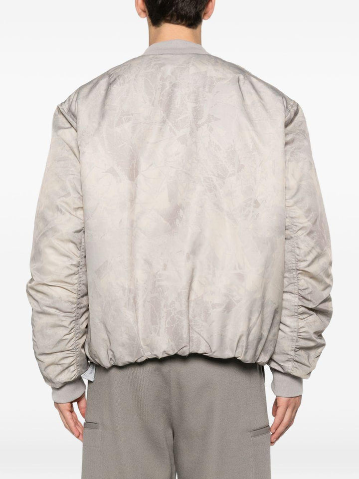 Bomber a colori neutri con zip 