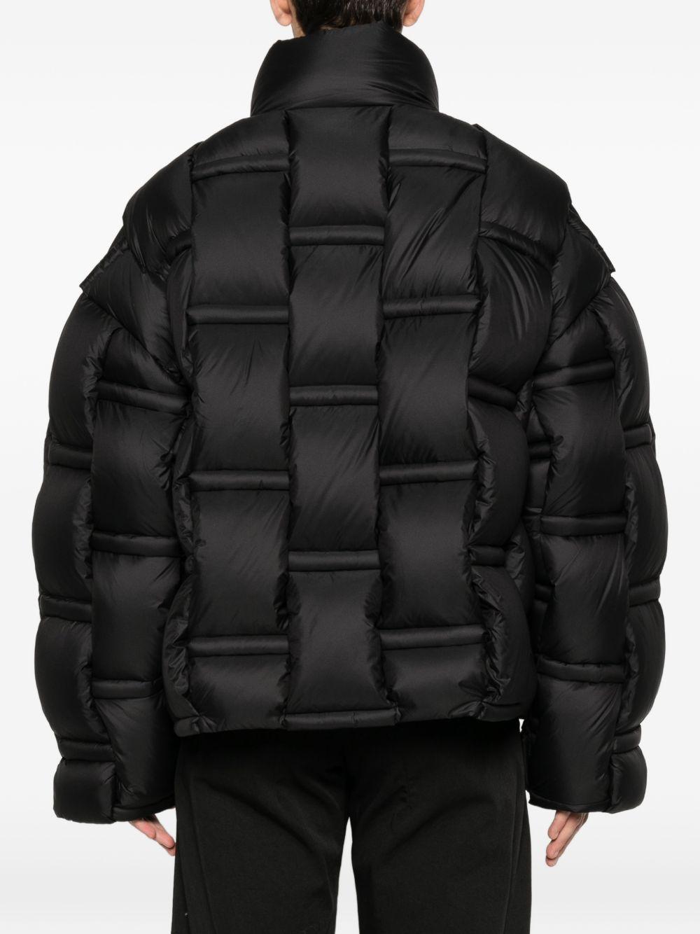 Piumino nero con inserti 