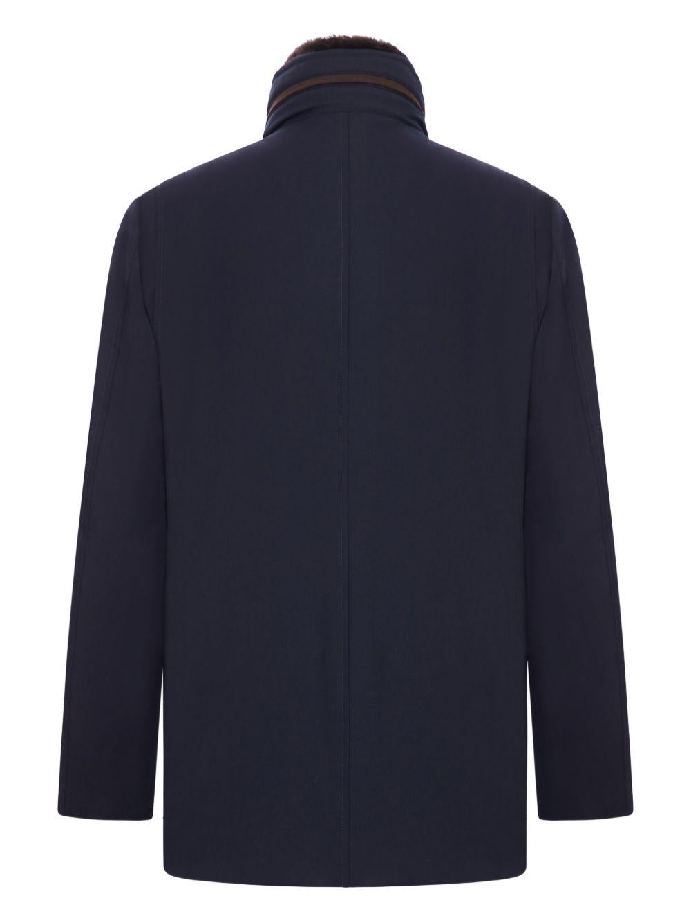 Giacca blu scuro con collo in pelliccia 