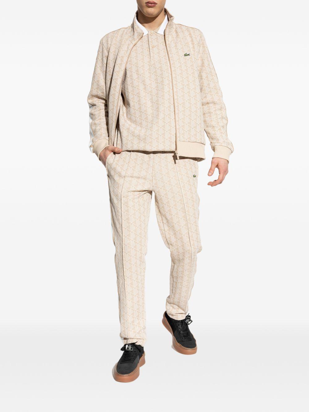 Polo beige chiaro con monogramma 