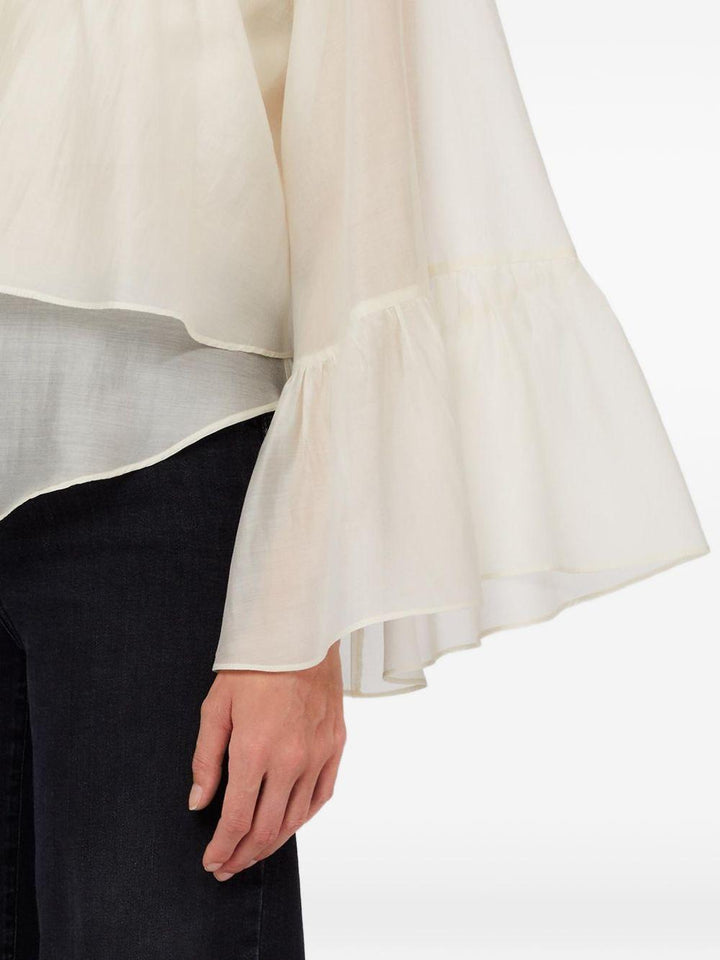 Blusa con maniche ampie 