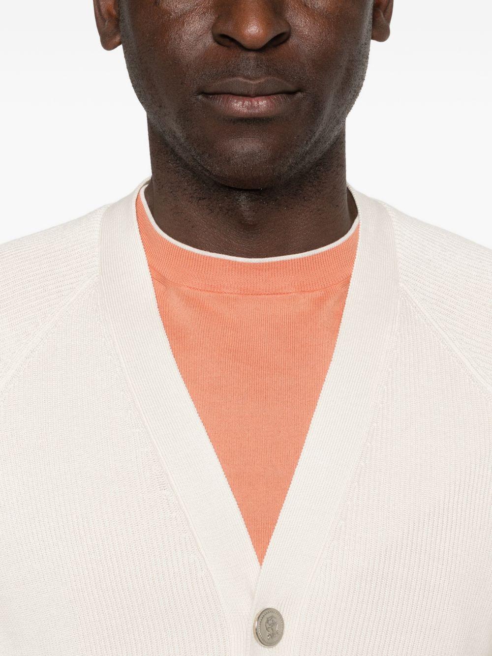 Cardigan beige con scollo a V 