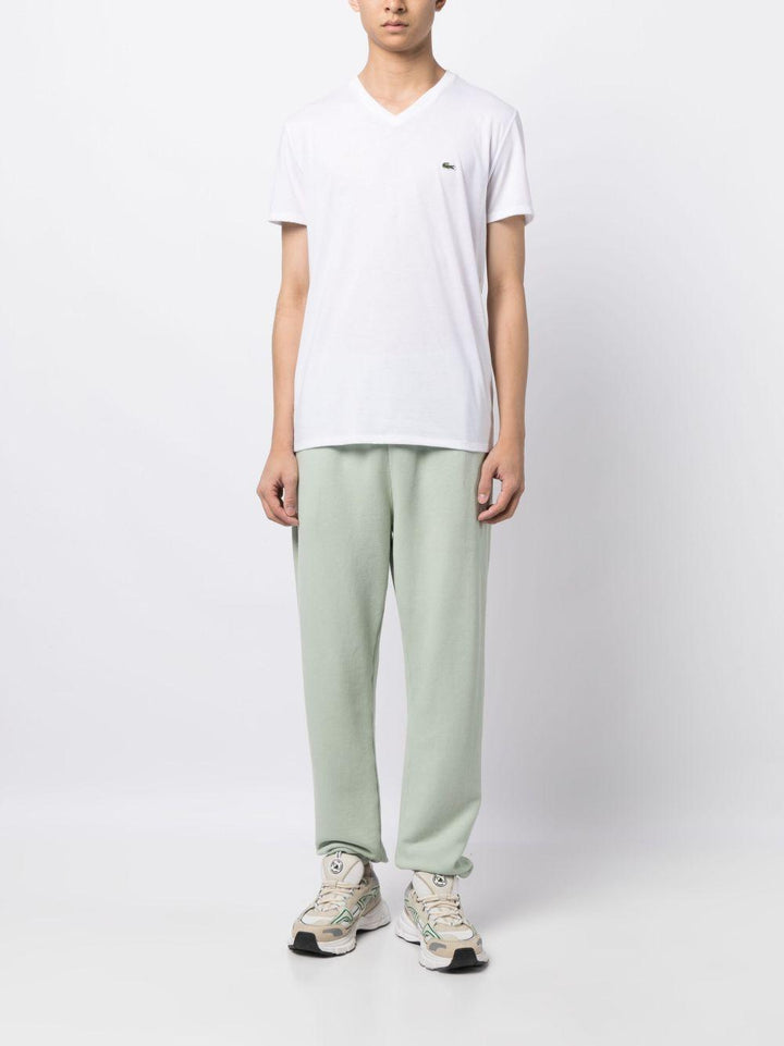 T-shirt bianca con scollo a V 