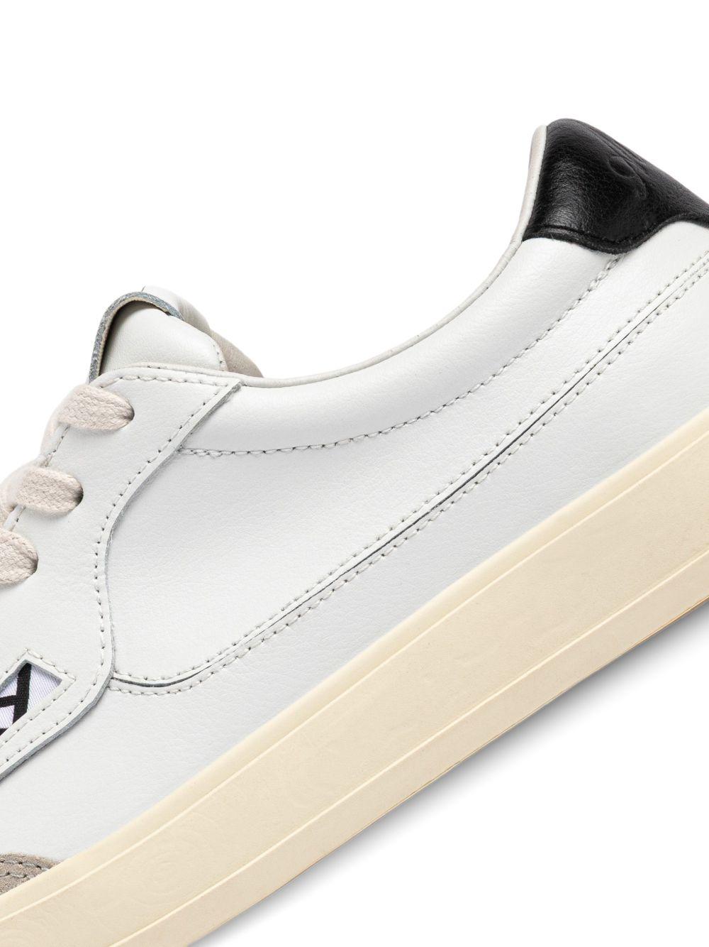 Sneakers bianche con pannelli in pelle 