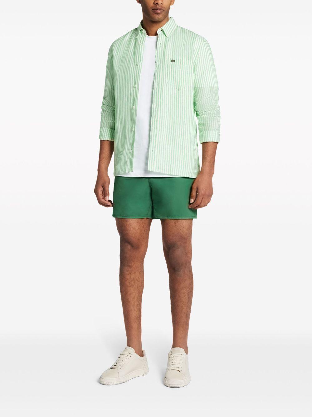Costume da bagno verde con ricamo 
