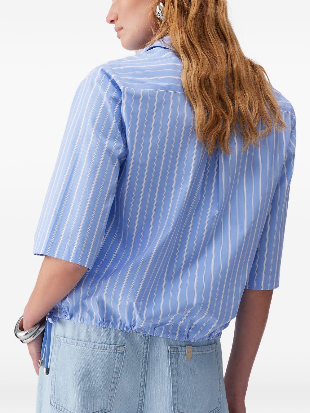 Camicia a righe con tasca 