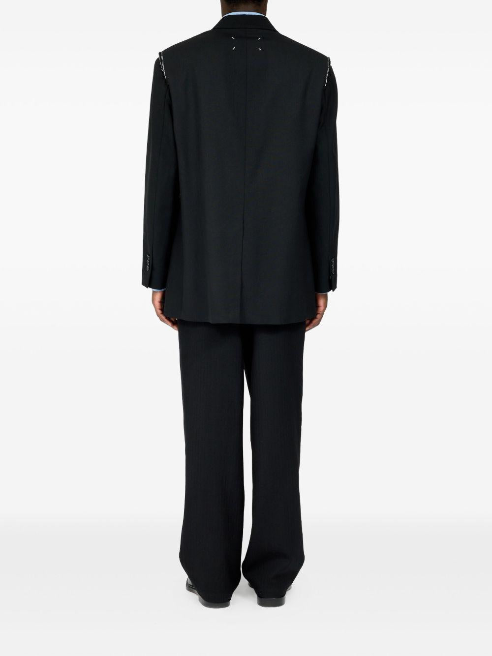 Blazer nero con spalline 
