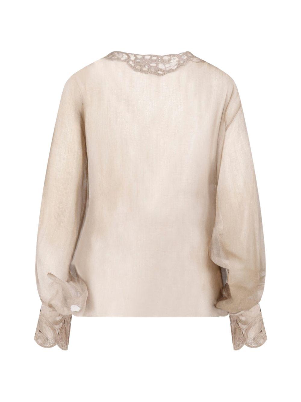 Blusa con ricami 