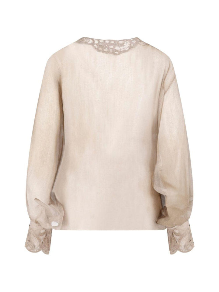 Blusa con ricami 