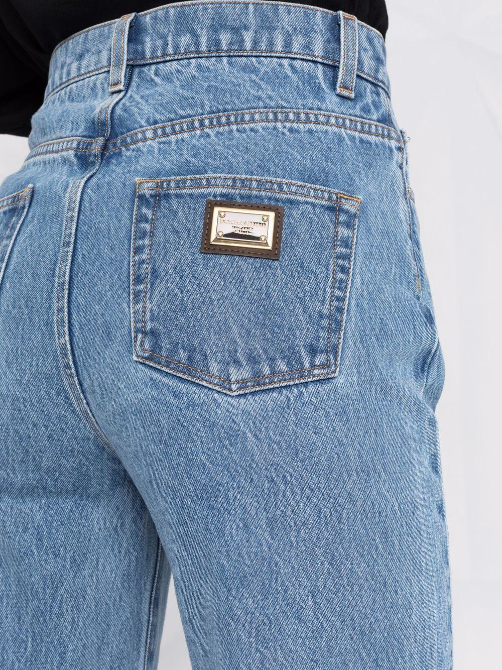 Jeans dritti con applicazione 