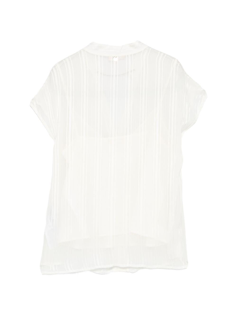 Blusa con scollo a V 
