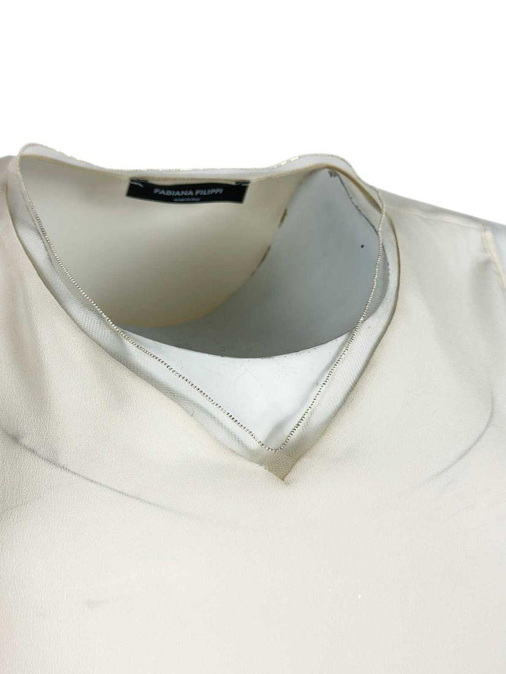 Top smanicato 