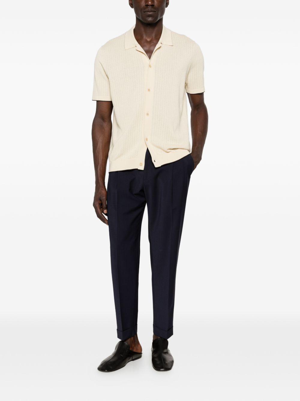 Pantaloni blu scuro con risvolto 