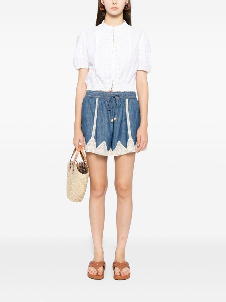 Shorts con inserti 