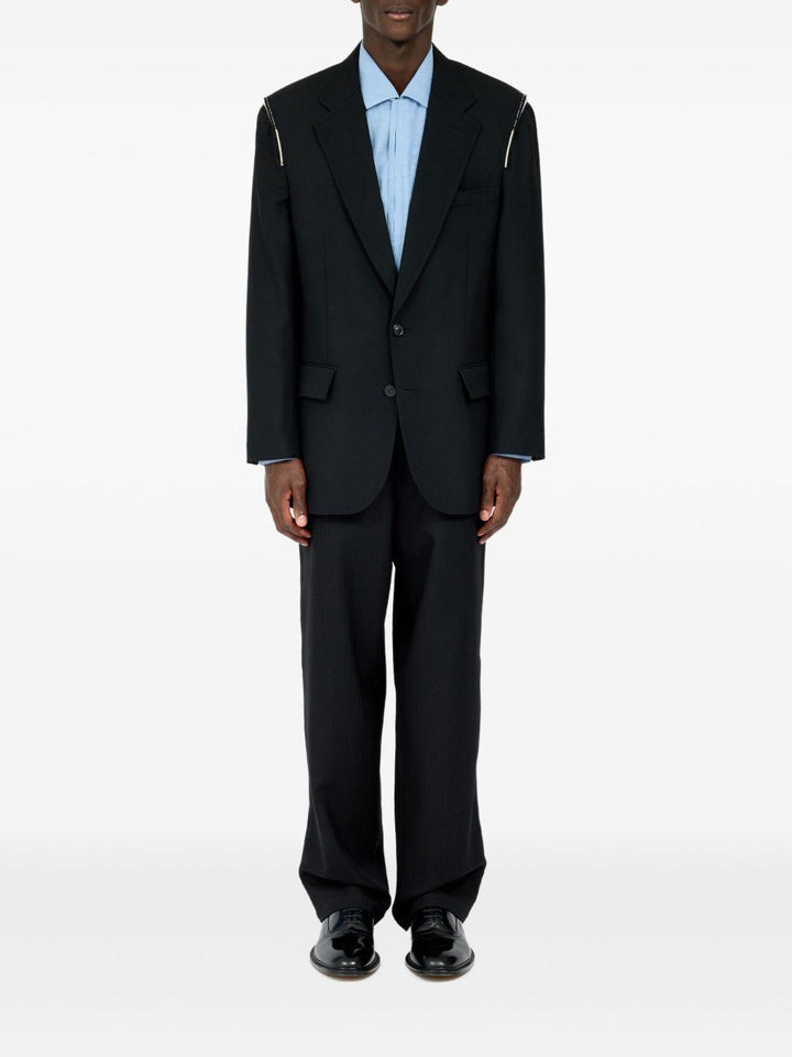 Blazer nero con spalline 