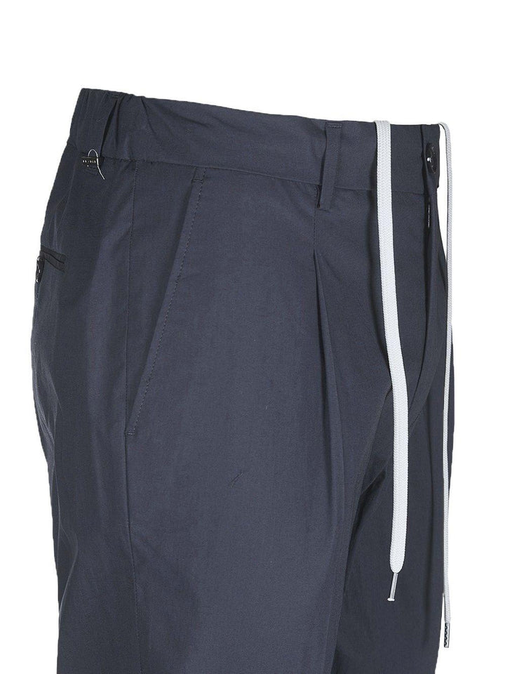 Pantaloni blu scuro con coulisse 
