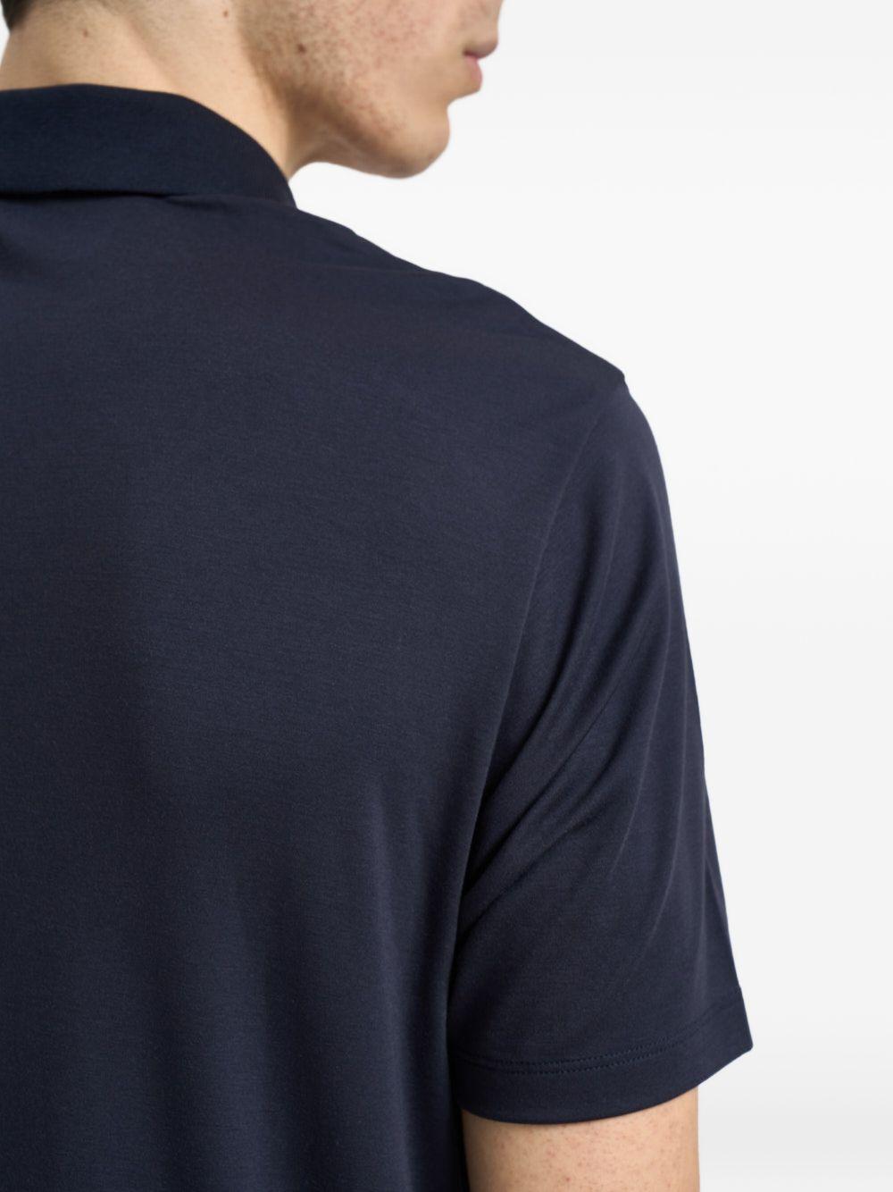 Polo blu con logo 