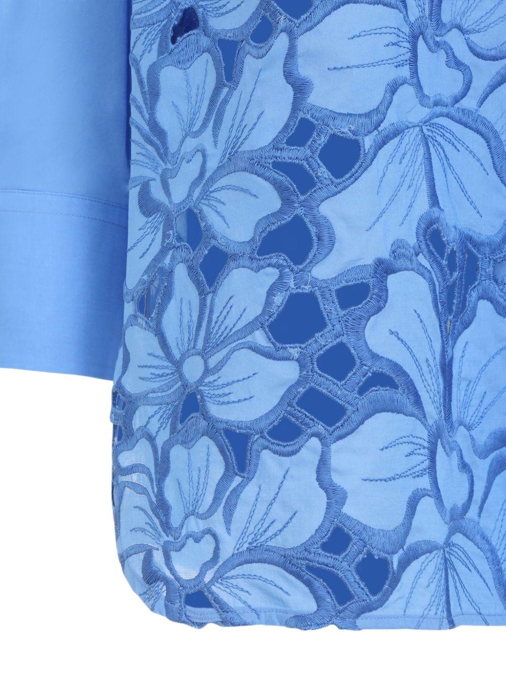 Camicia con applicazioni floreali 