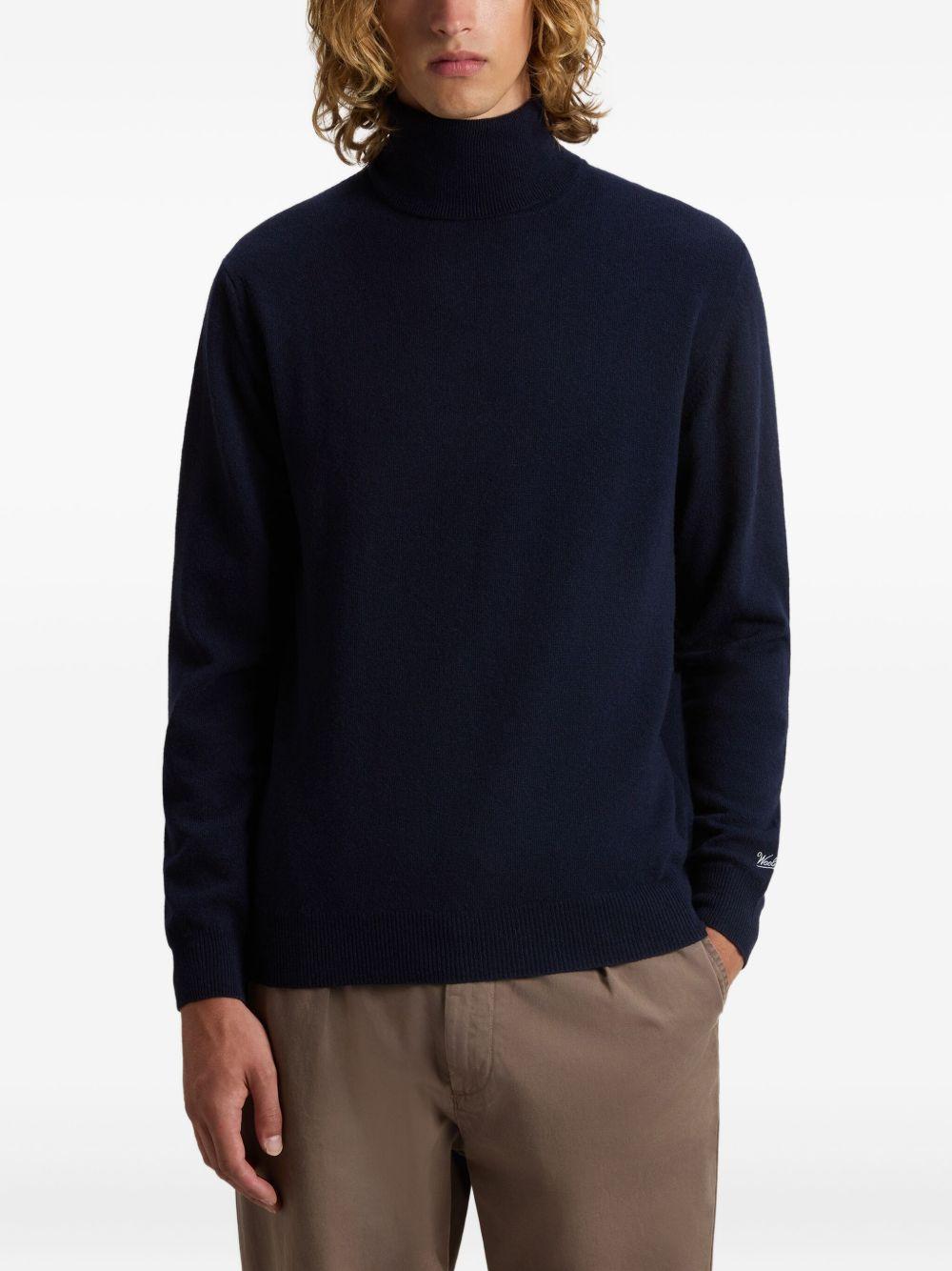 Maglione a collo alto blu 