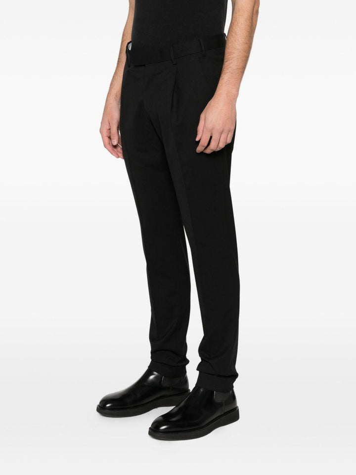 Pantaloni neri con risvolto 