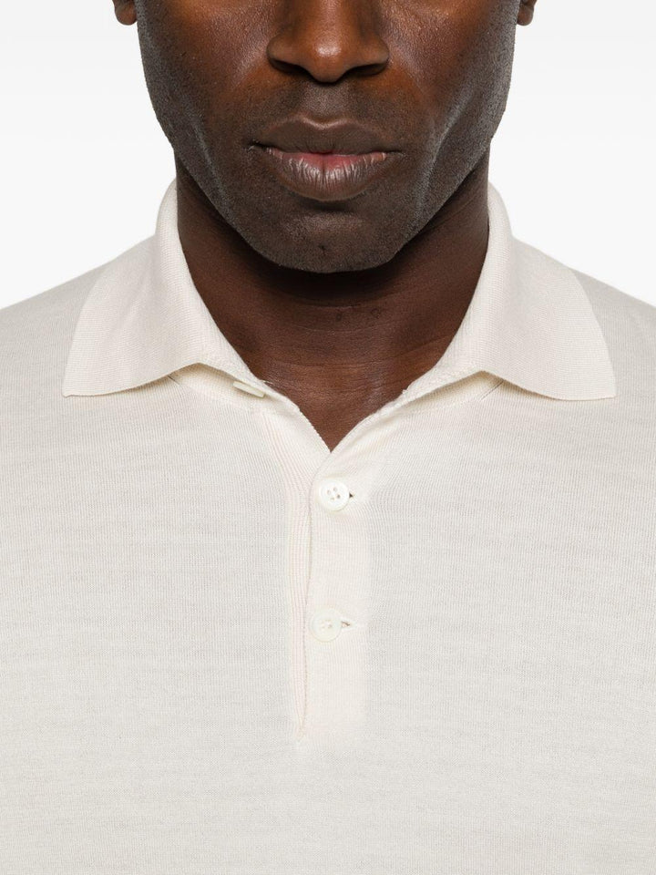 Polo beige chiaro con bottoni 