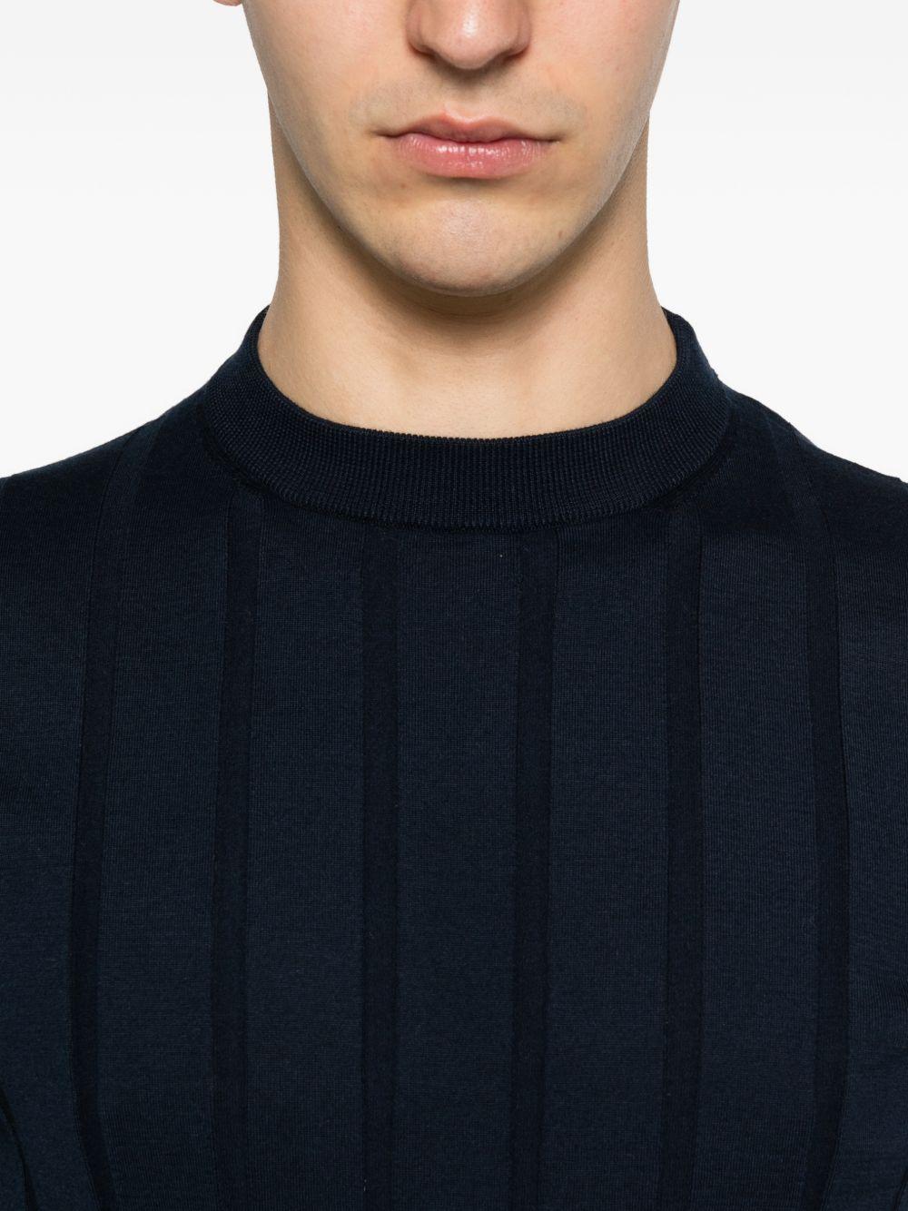 Maglia blu a maniche corte 