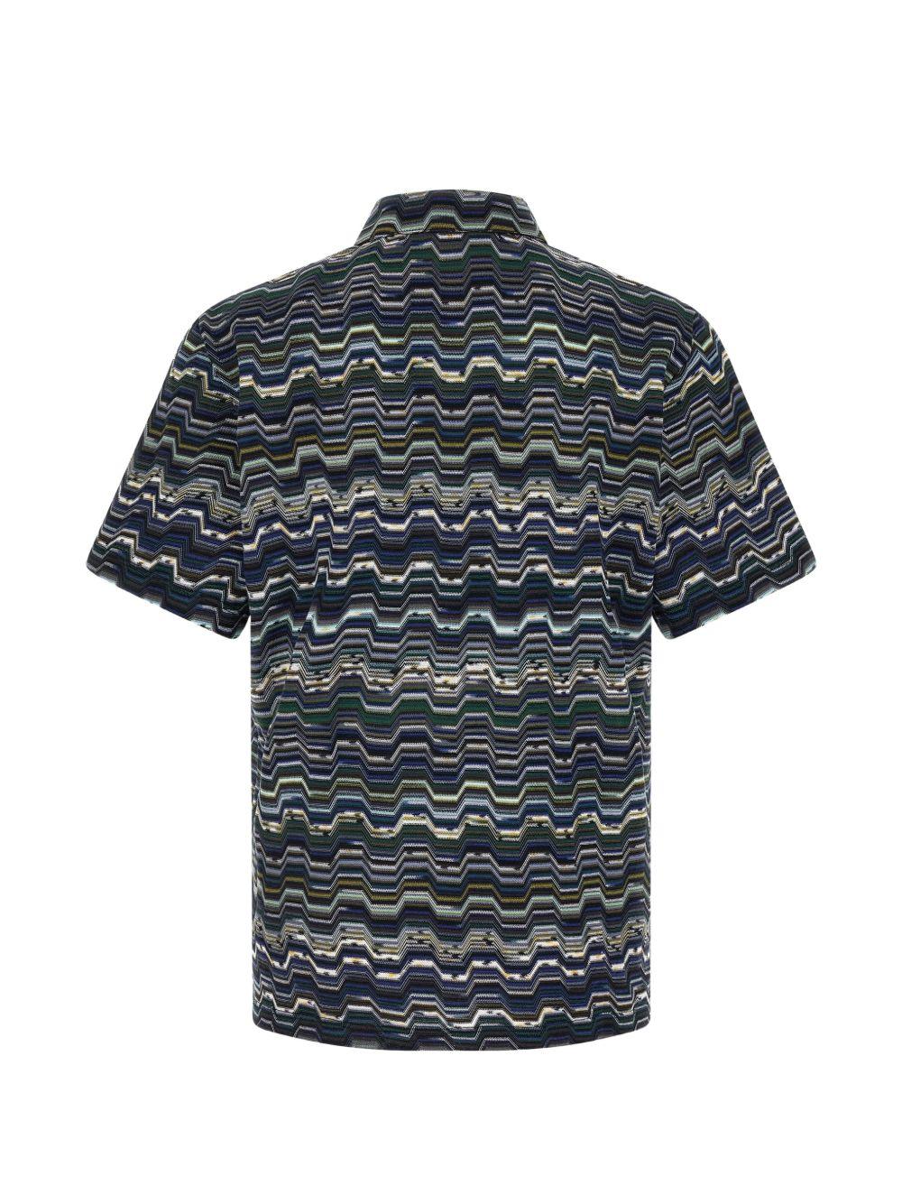 Polo blu con motivo zig zag 