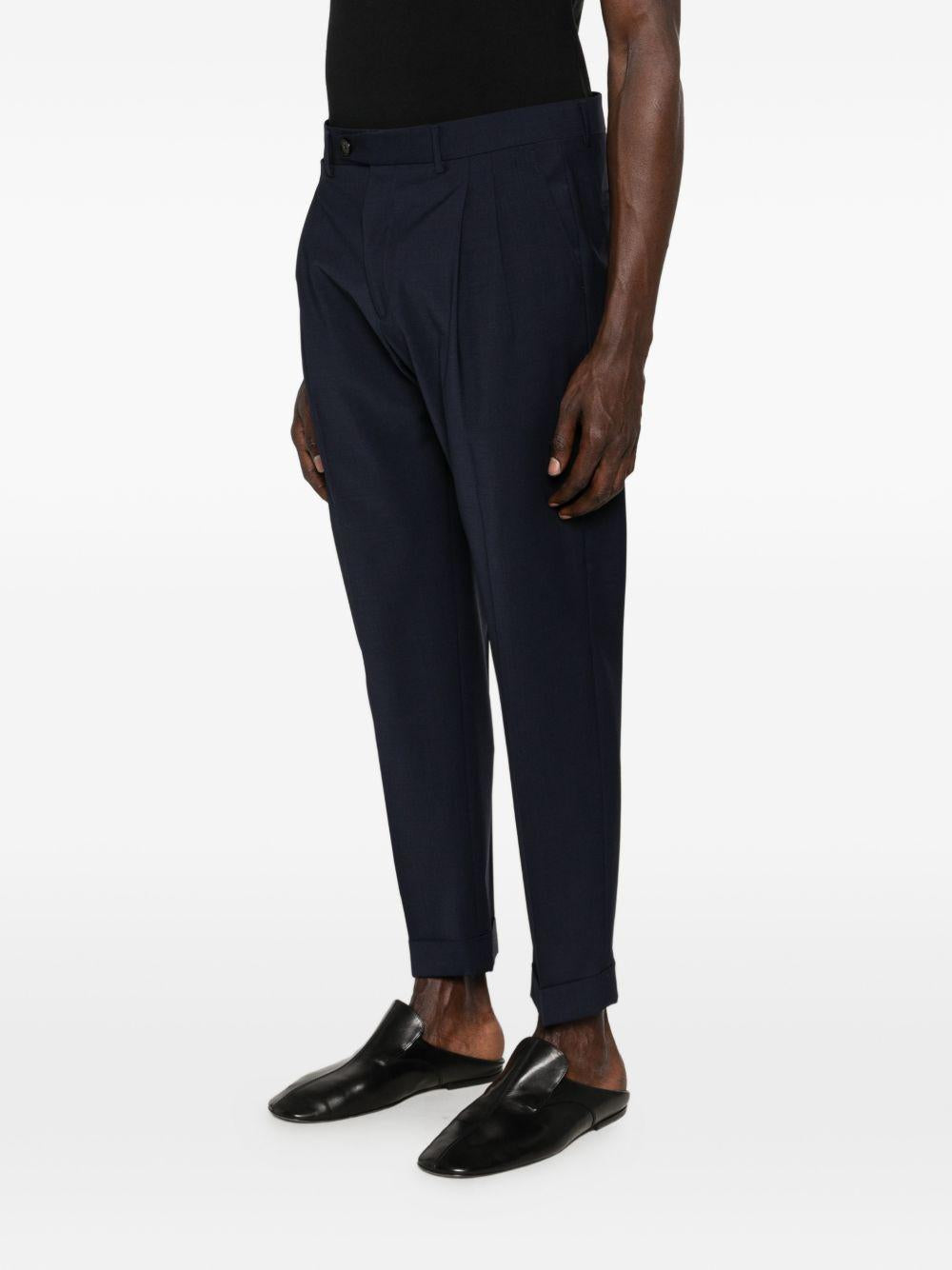 Pantaloni blu scuro con risvolto 