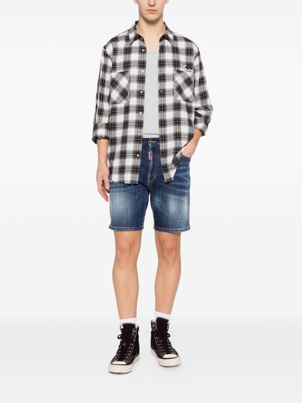 Shorts blu navy effetto distressed 
