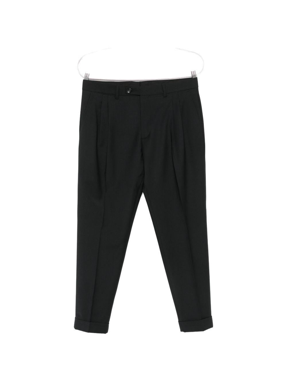 Pantaloni neri con risvolto 