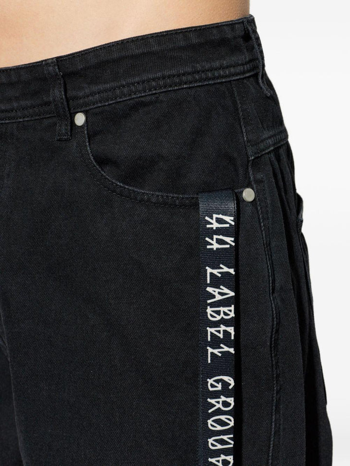 Pantaloni neri con logo 