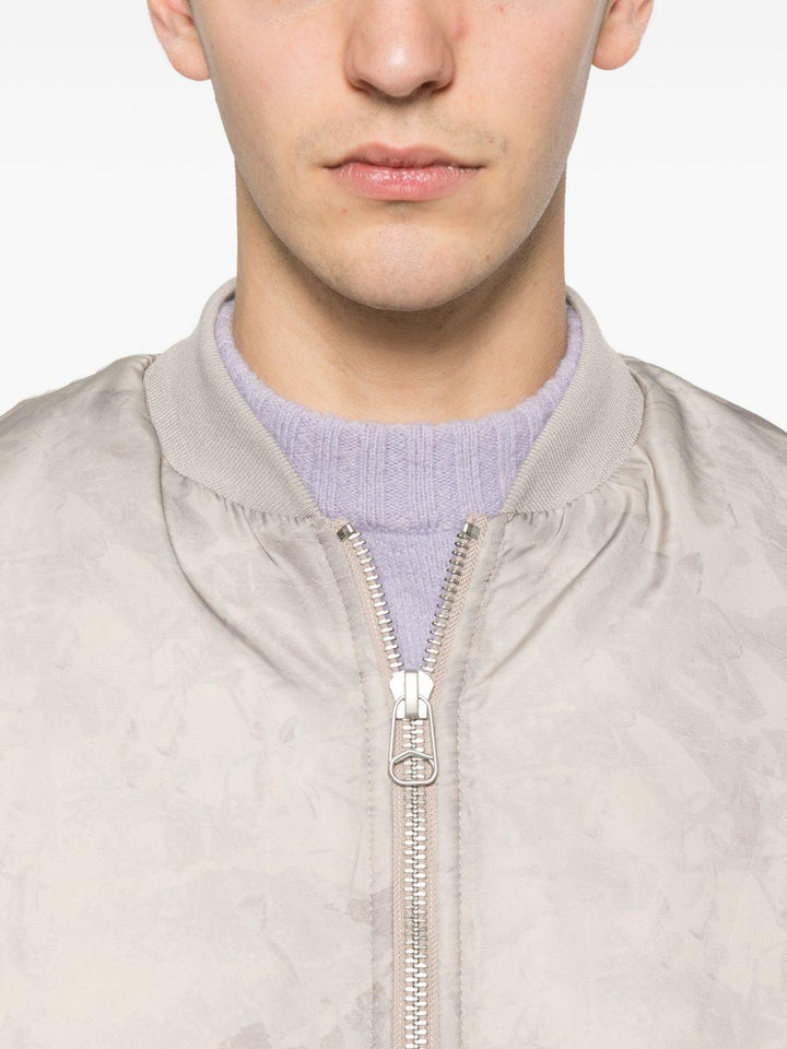 Bomber a colori neutri con zip 