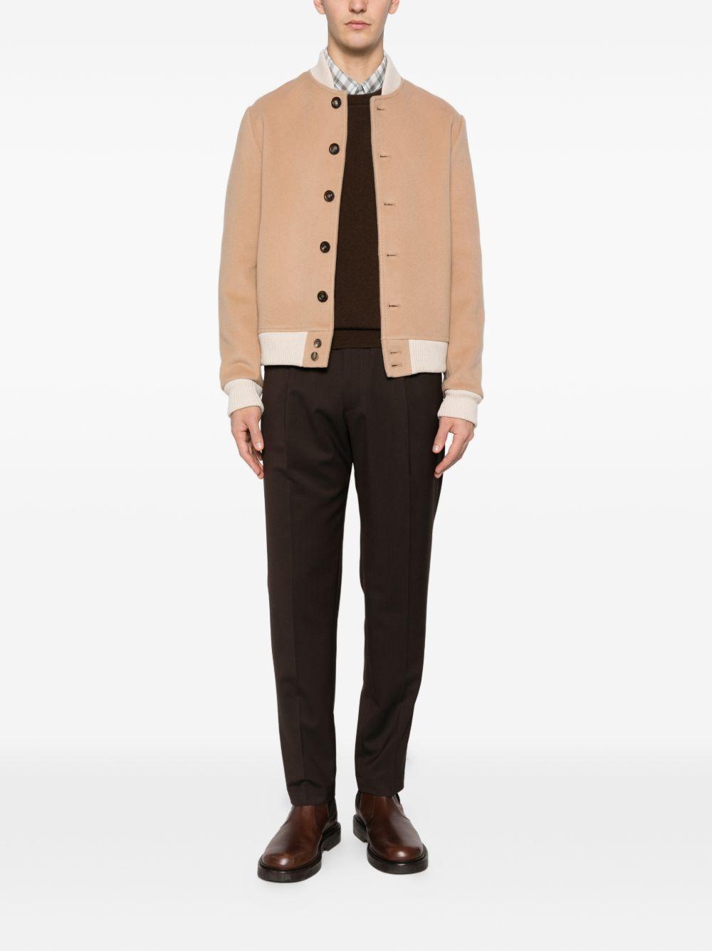 Bomber beige con bottoni 
